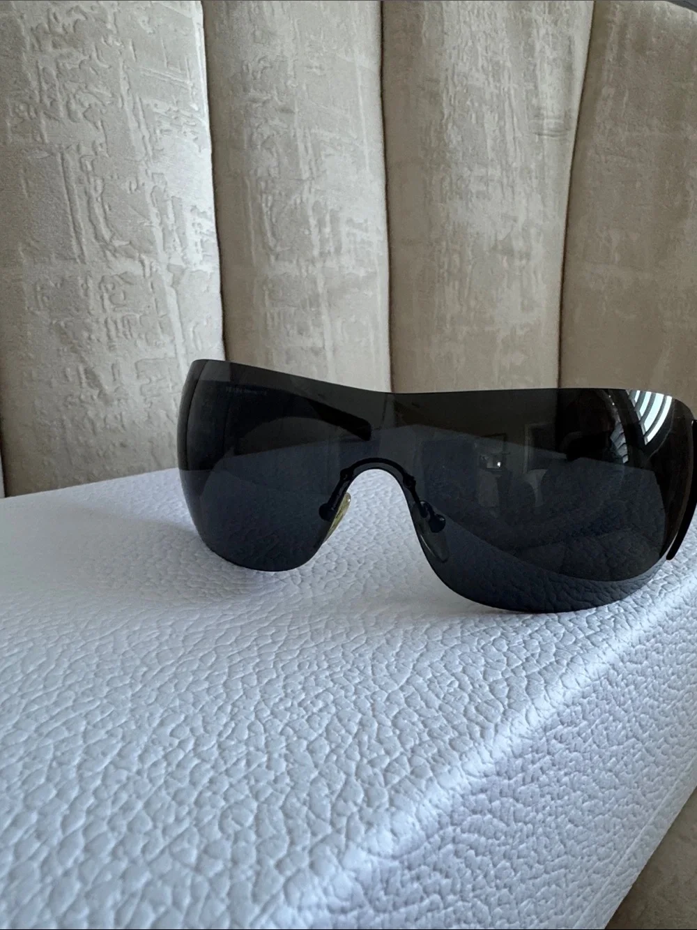 Prada Black Shield Sunglasses with Red Temple Accent
